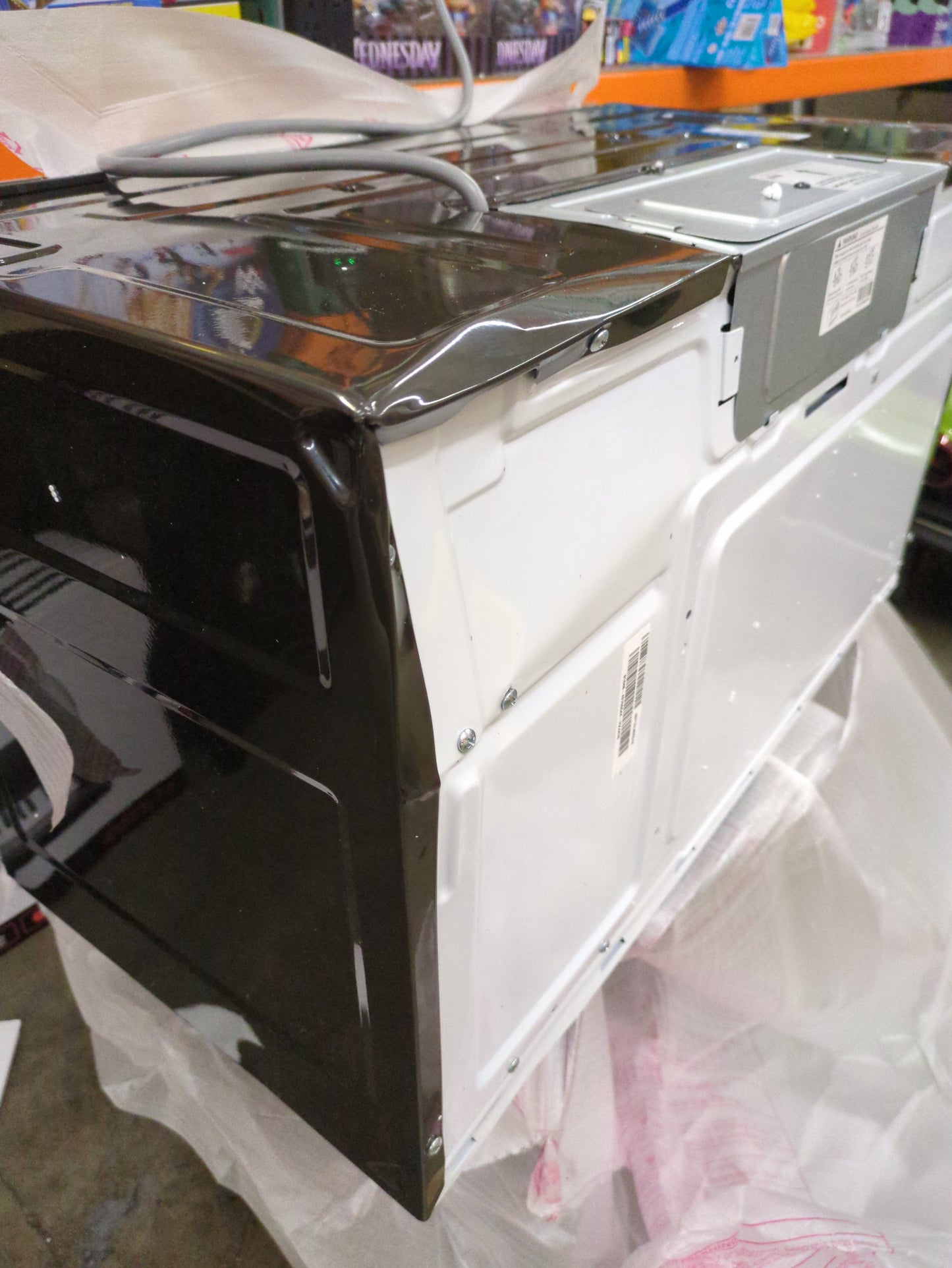 NEW W/ DAMAGE - GE 1.9 cu. ft. Over-the-Range Sensor Microwave Oven with Easy Clean Interior - Retail $439