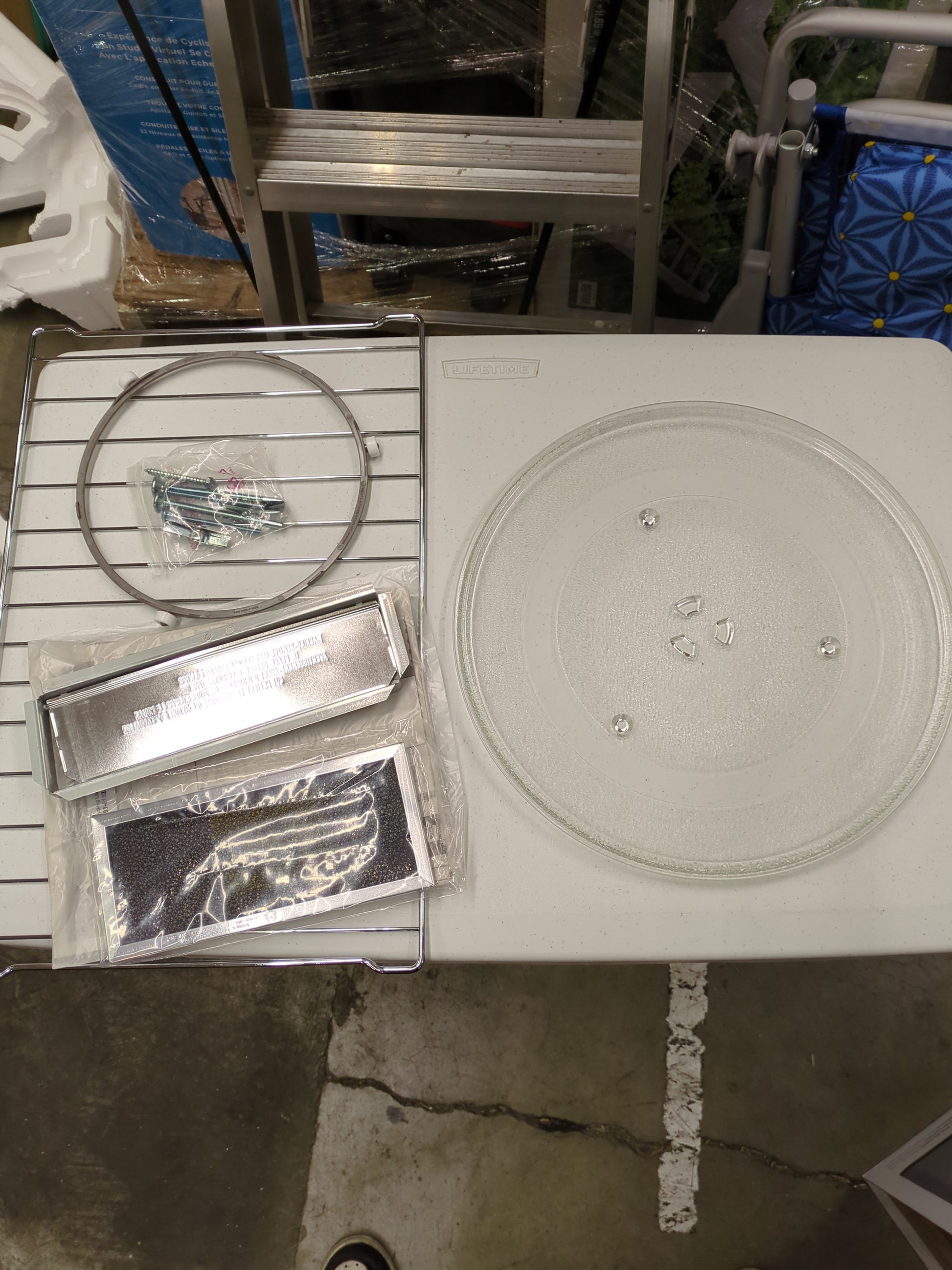 Samsung 2.1 cu. ft. Over-the-Range Microwave with Sensor Cook ME21M706BAG - Retail $479