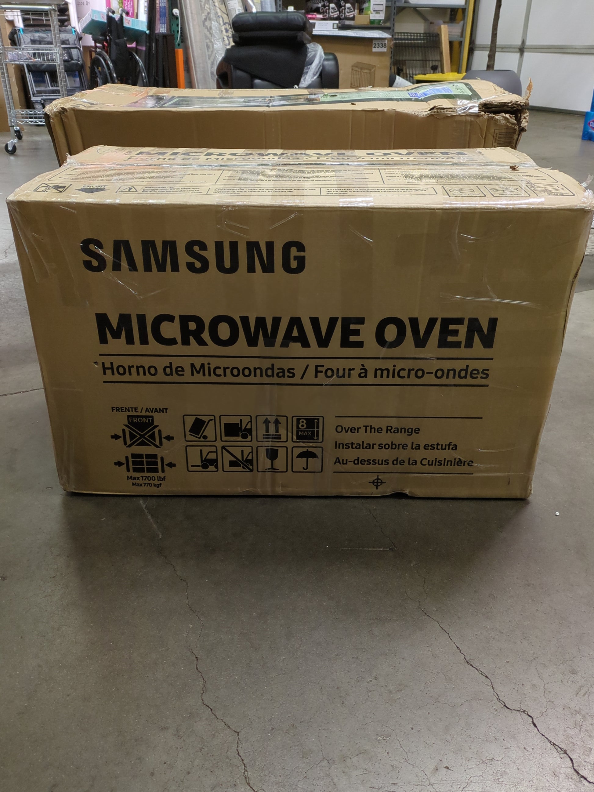 Samsung 2.1 cu. ft. Over-the-Range Microwave with Sensor Cook ME21M706BAG - Retail $479