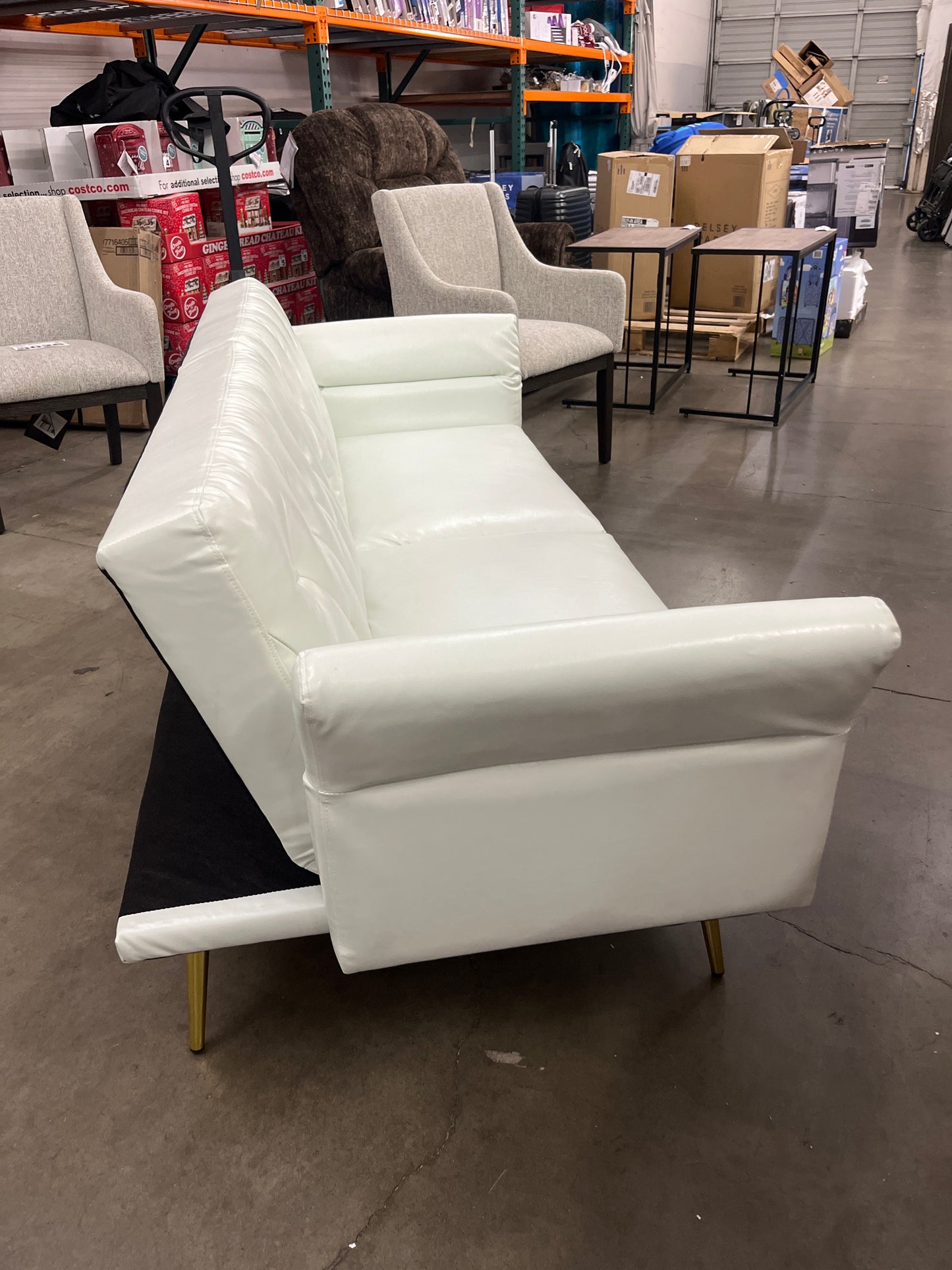 NEW - Elevon Futon Couch, Convertible Futon Sofa Bed, Faux Leather Folding Recliner Sleeper, Modern Lounge Sofa with Adjustable Armrests and Pillow for Living Room, Small Space, Office, Apartment, White - Retail $270