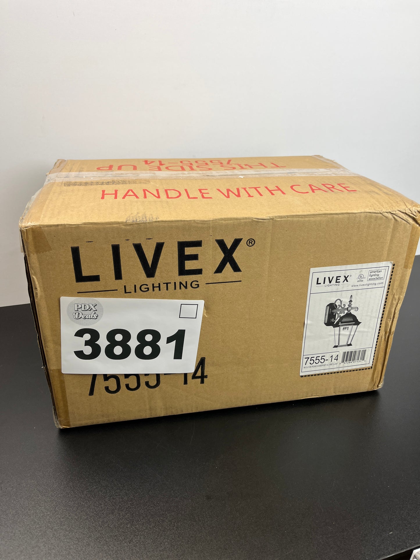 Livex Lighting 7555-04 Hamilton 3 Light Black Cast Aluminum Outdoor Wall Lantern with Clear Beveled Glass, 8" x 9" x 20" - Retail $73