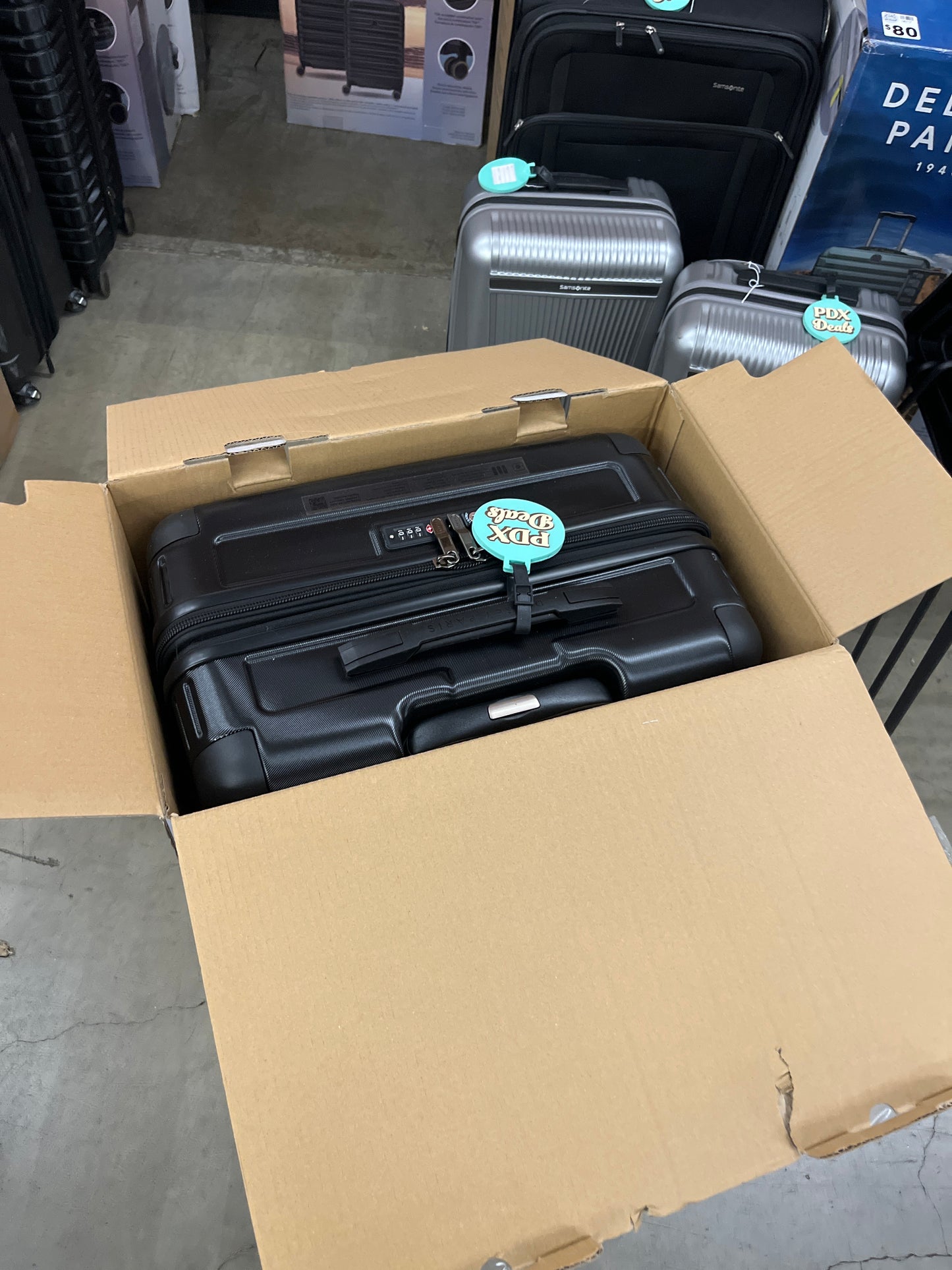 NEW - Delsey Paris Black Hardside Luggage Set