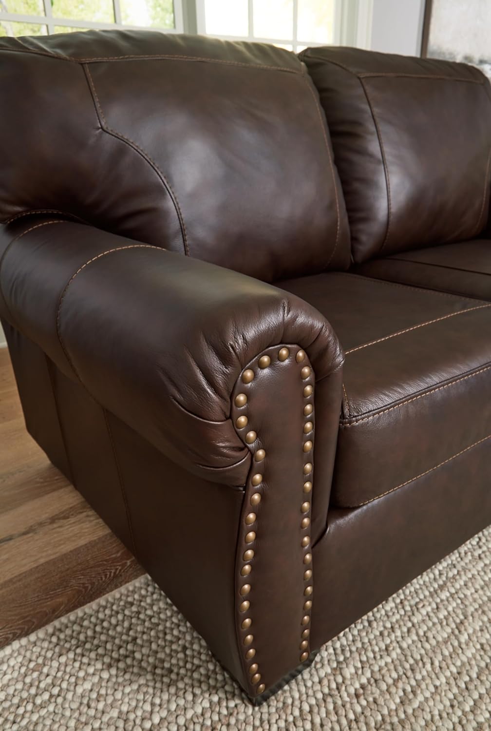 Signature Design by Ashley Colleton Classic Leather Match Sofa with Nailheads, Dark Brown - Retail $1057