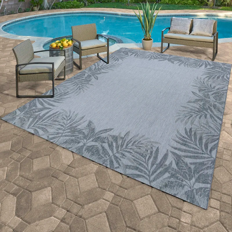 NEW - Costco - Naples Indoor/Outdoor Area Rug, Palm Border 7'10" x 13' - Retail $159