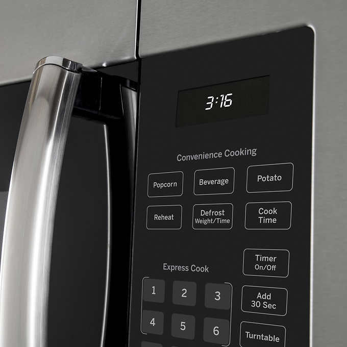 NEW - GE 1.6 cu. ft. Over-the-Range Microwave Oven with Cooktop Lighting and 300-CFM Exhaust Fan JVM3160RFSS - Retail $359