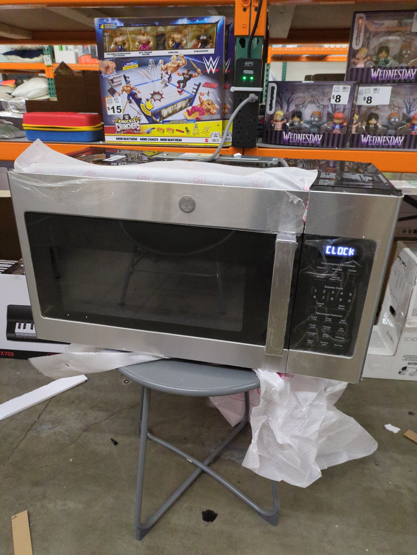 NEW W/ DAMAGE - GE 1.9 cu. ft. Over-the-Range Sensor Microwave Oven with Easy Clean Interior - Retail $439